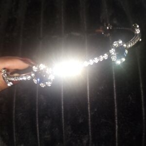 Elegant Black and Crystal Headband with Blue Sapphire Accents